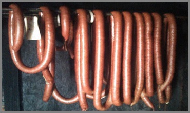 Sausage on Rack in Smokehouse